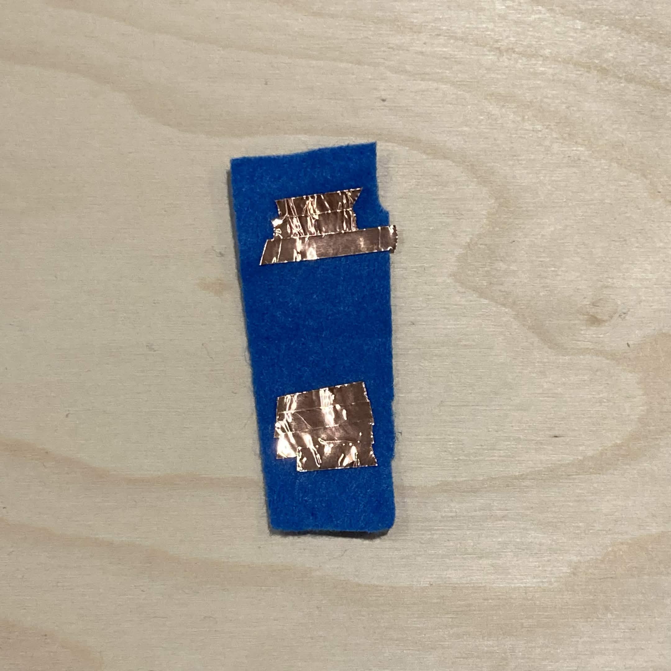 I made a felt switch that can be folded to act as a button